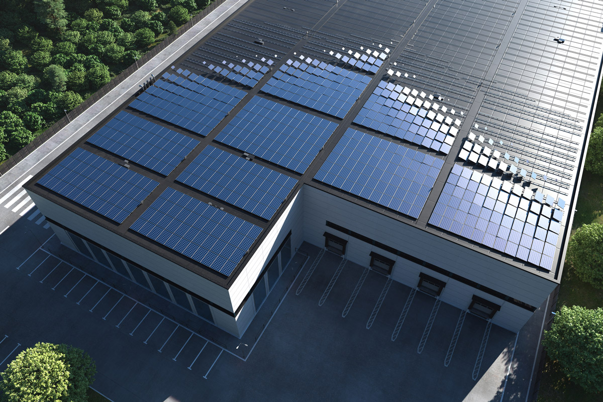 Aerial view showing solar panels on commercial industrial building